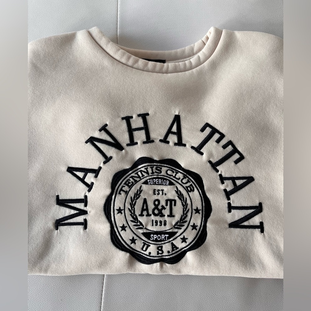 SHEIN Cream Sweatshirt with Black Manhattan Logo